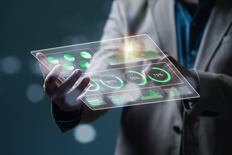sales manager reviewing metrics on tablet